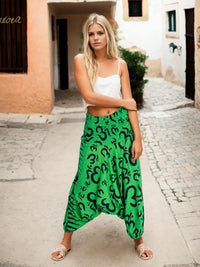 Kimago grüne Afghanhose mit schwarzem Om-Symbol